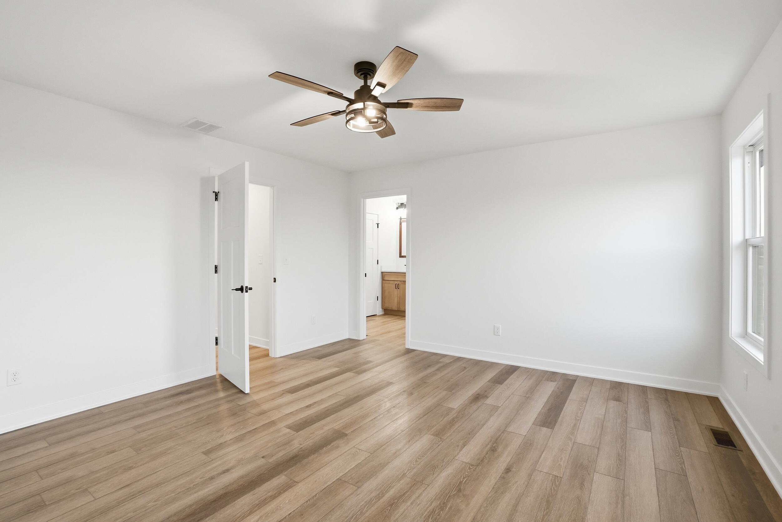 508 West Beaver Street Morocco, IN 47963 - Photo 24 of 33 a view of empty room with wooden floor and fan