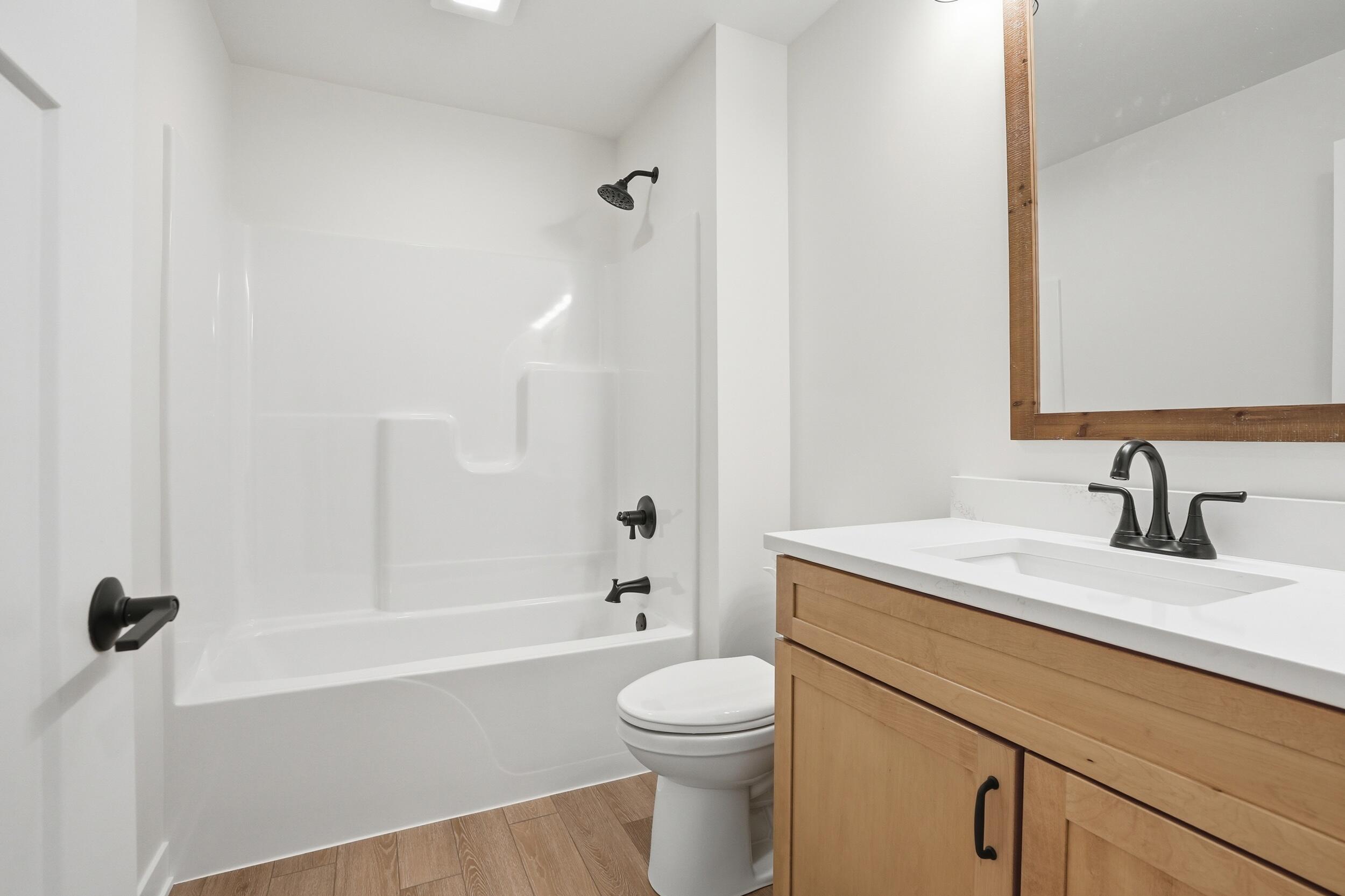 508 West Beaver Street Morocco, IN 47963 - Photo 31 of 33 a bathroom with a sink a toilet and a bathtub