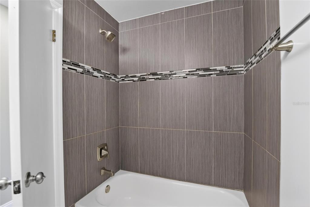 2340 Merrily Circle South Seffner, FL 33584 - Photo 29 of 52 a bathroom with a shower and a sink