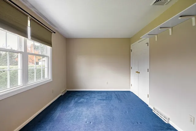 a bathroom with a double vanity sink toilet and shower