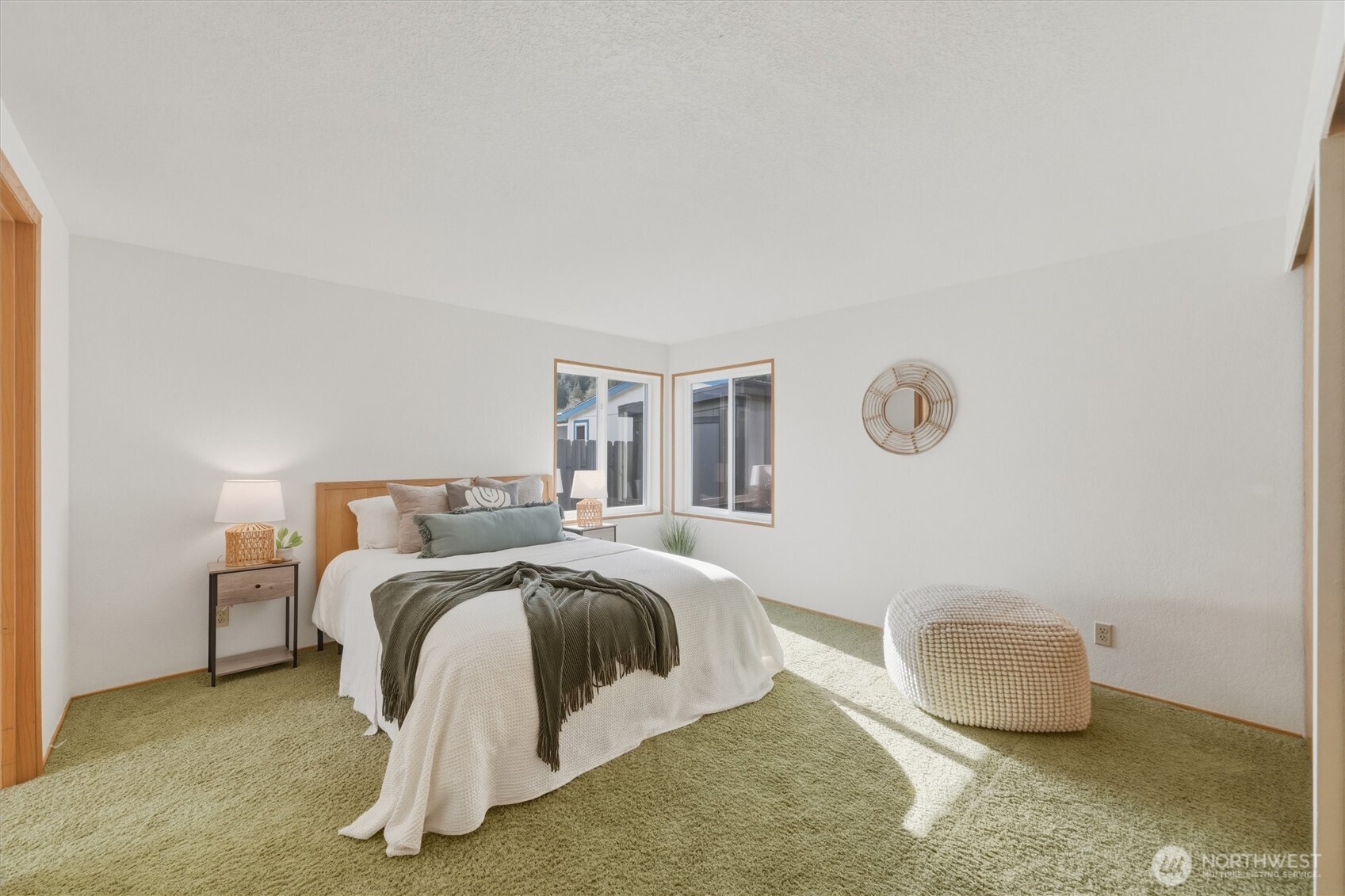 2015 24th Street, Unit 94 Bellingham, WA 98225 - Photo 18 of 40 a bedroom with a bed and a couch