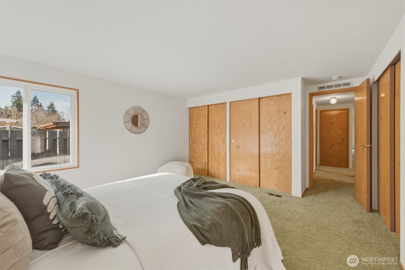 2015 24th Street, Unit 94 Bellingham, WA 98225 - Photo 24 of 40 a bedroom with a bed and a window