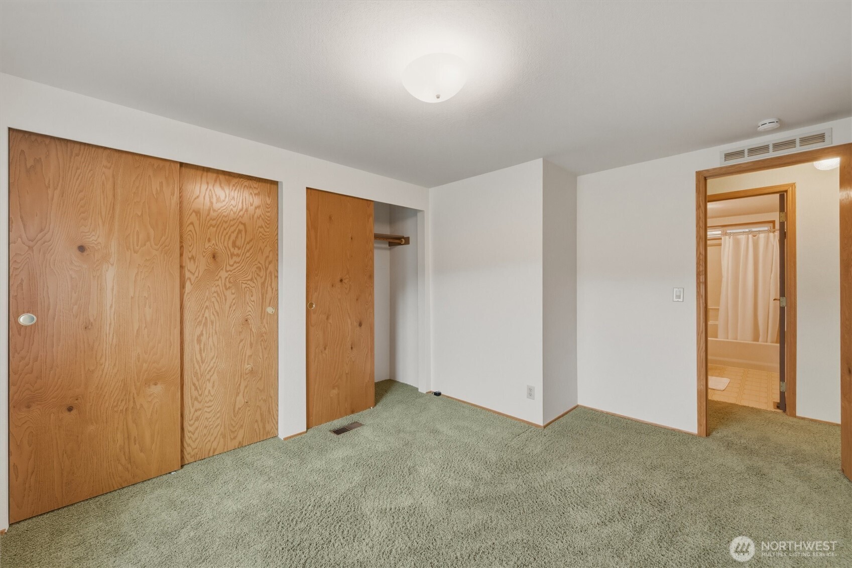 2015 24th Street, Unit 94 Bellingham, WA 98225 - Photo 28 of 40 a view of an empty room and closet area