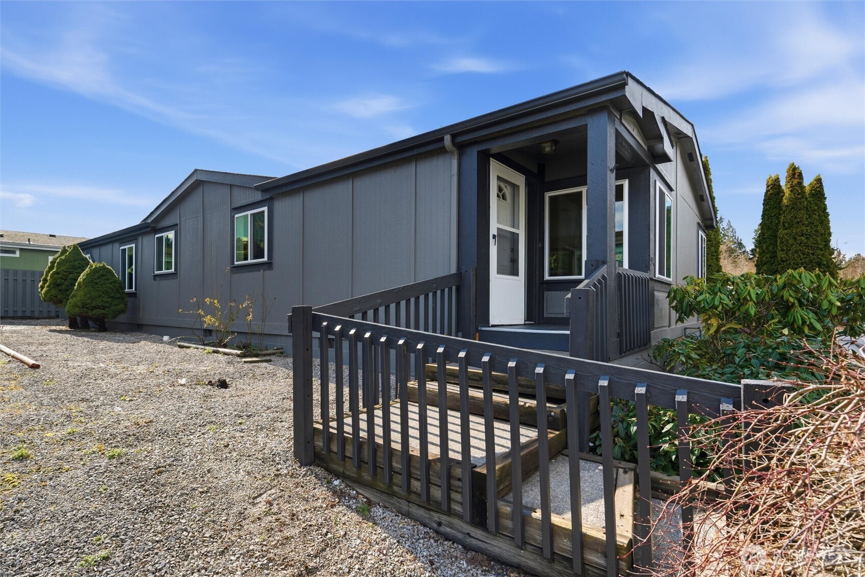 2015 24th Street, Unit 94 Bellingham, WA 98225 - Photo 33 of 40 a view of a house with a small yard