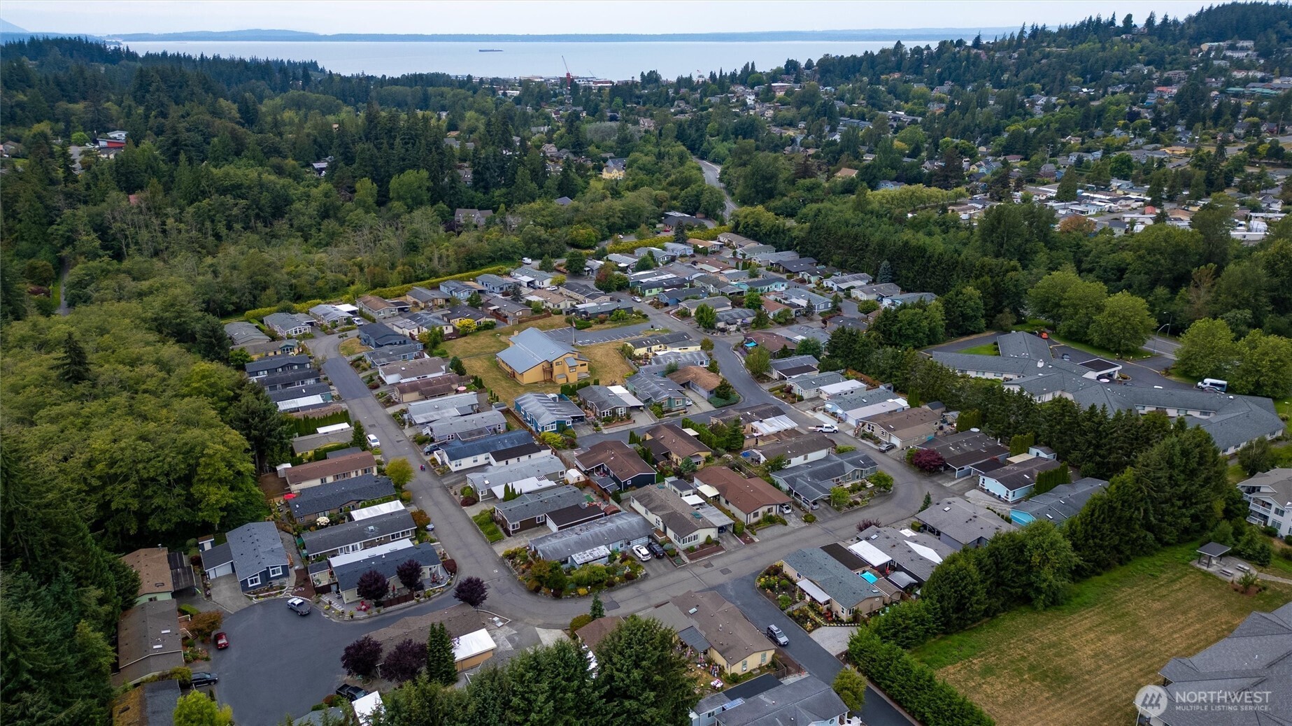 2015 24th Street, Unit 94 Bellingham, WA 98225 - Photo 34 of 40 an aerial view of residential houses with outdoor space