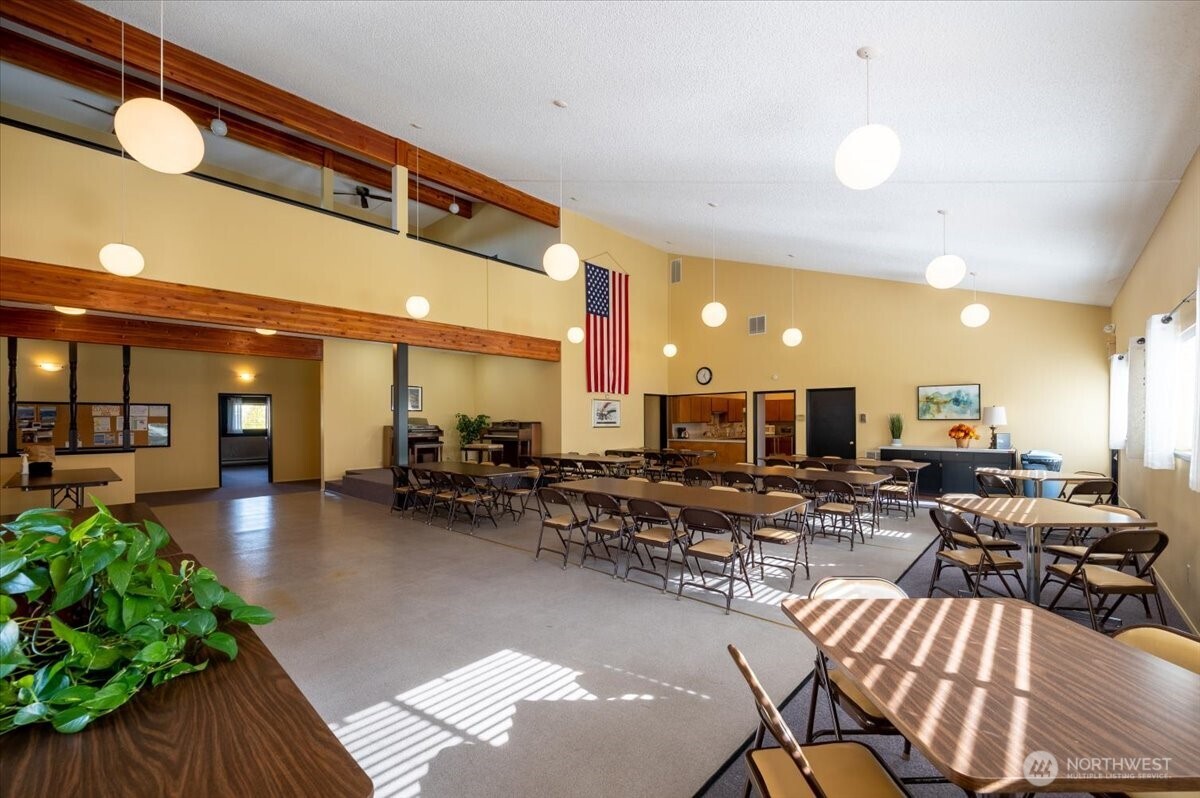 2015 24th Street, Unit 94 Bellingham, WA 98225 - Photo 36 of 40 a lobby with furniture and a potted plant