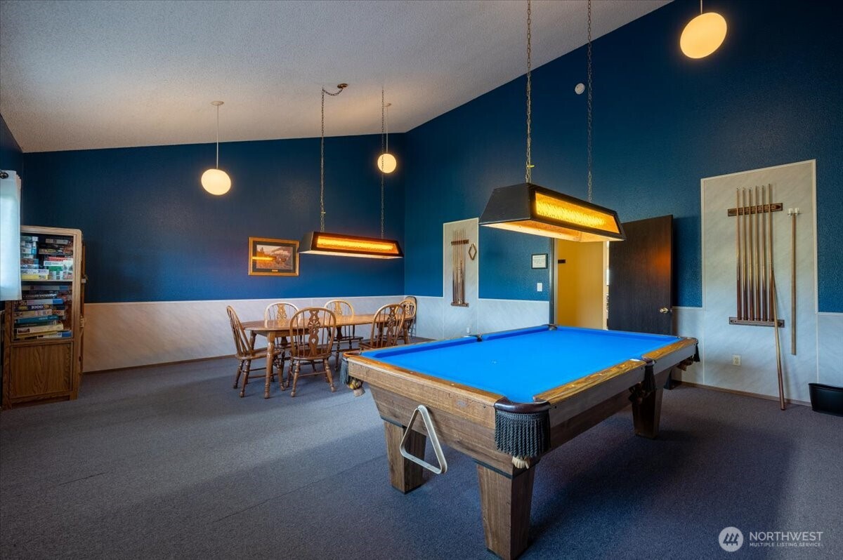 2015 24th Street, Unit 94 Bellingham, WA 98225 - Photo 37 of 40 a kitchen with table and chairs