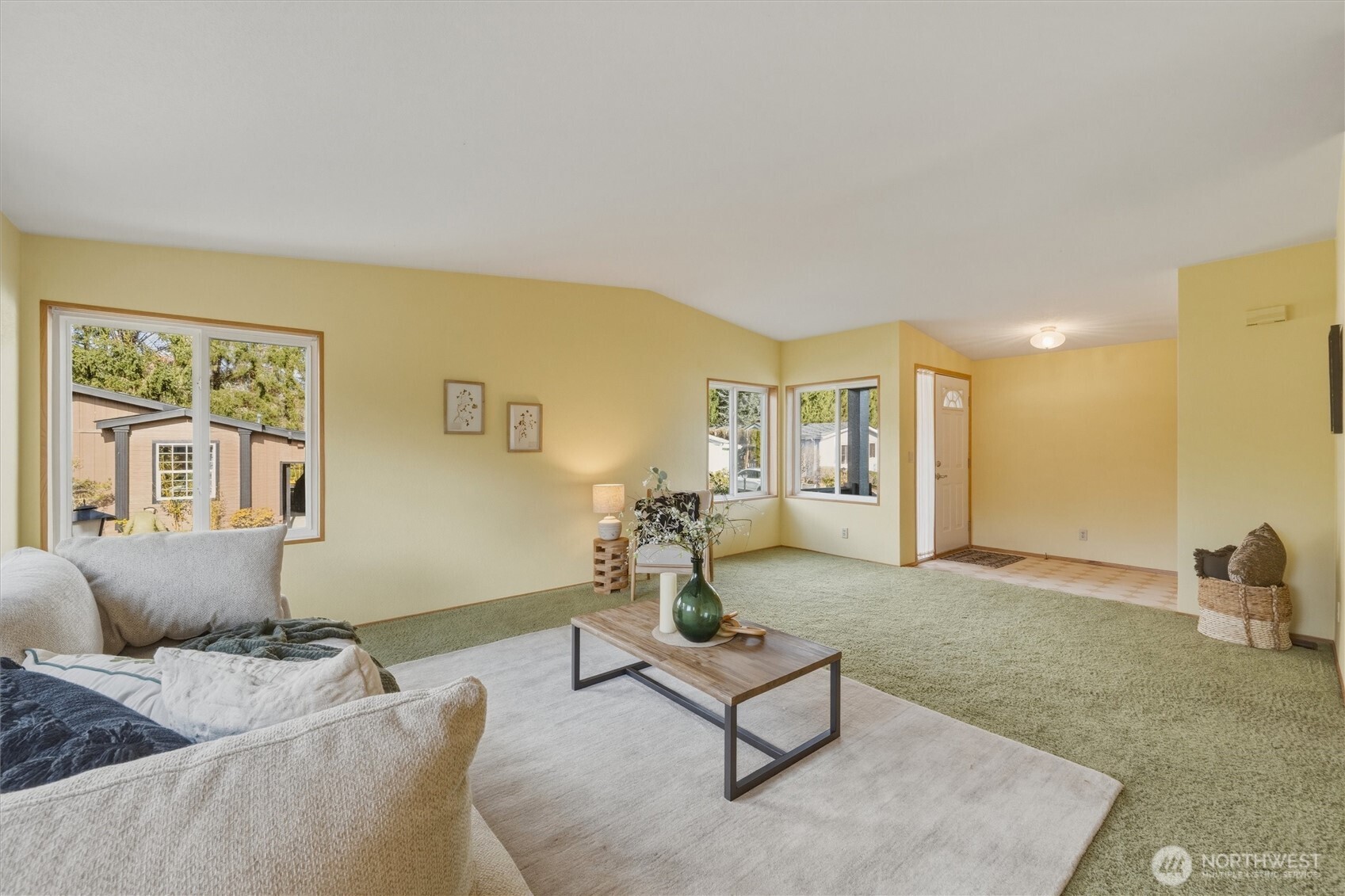 2015 24th Street, Unit 94 Bellingham, WA 98225 - Photo 4 of 40 a living room with furniture and a couch