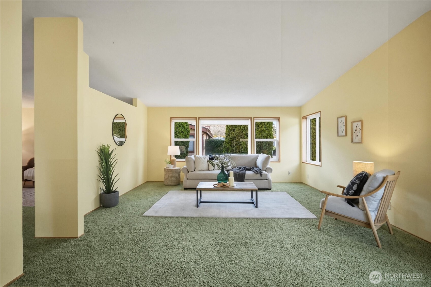 2015 24th Street, Unit 94 Bellingham, WA 98225 - Photo 5 of 40 a living room with furniture a window and a table