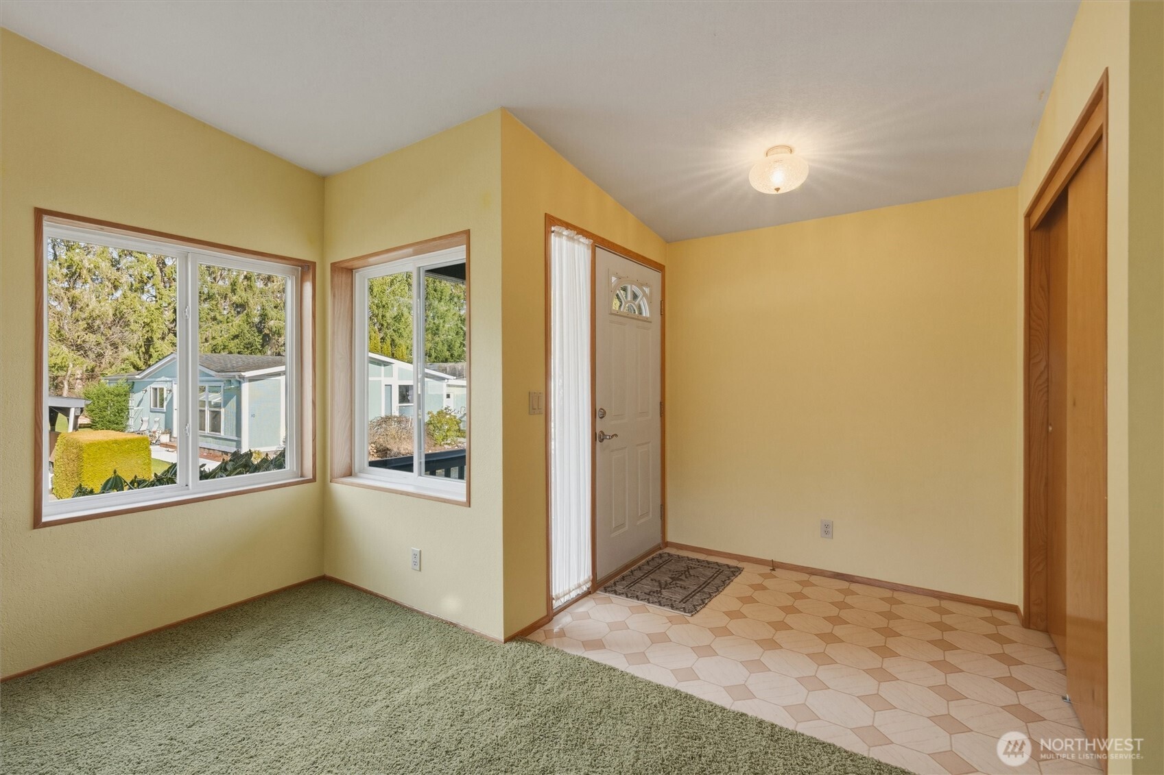 2015 24th Street, Unit 94 Bellingham, WA 98225 - Photo 7 of 40 a view of an empty room with a window