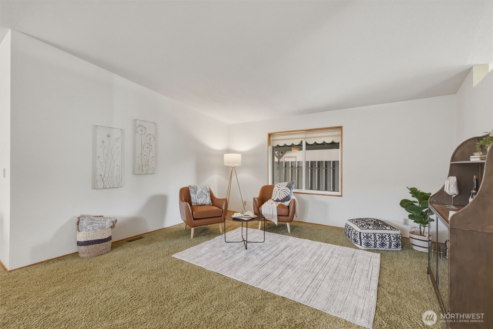 2015 24th Street, Unit 94 Bellingham, WA 98225 - Photo 10 of 40 a living room with furniture and wooden floor