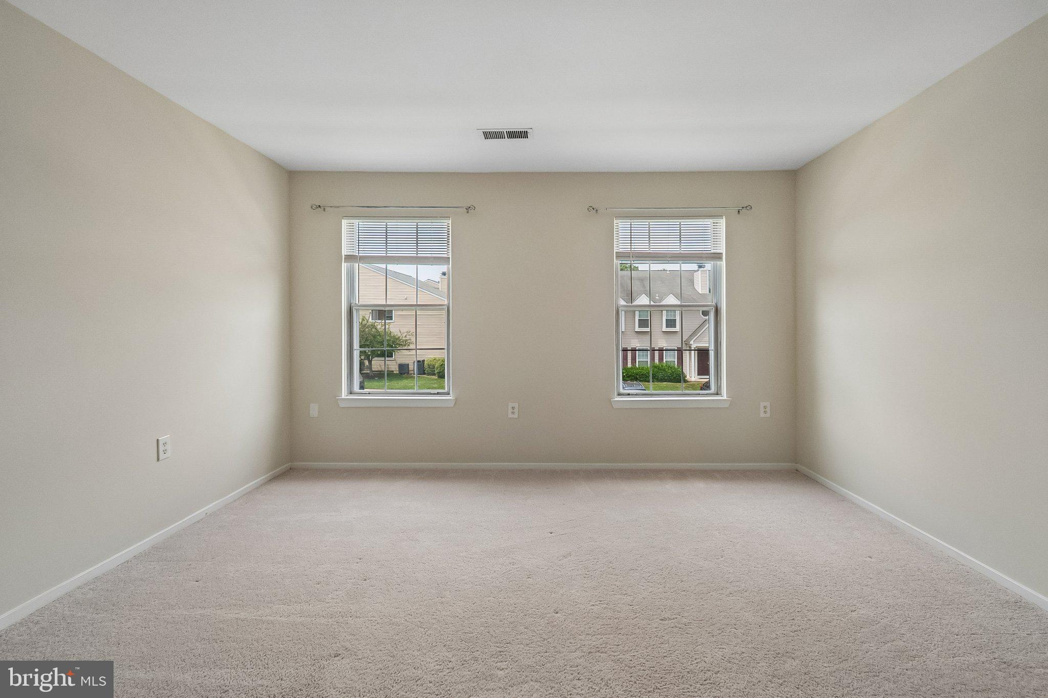 7822 Harrowgate Circle, Unit D Springfield, VA 22152 - Photo 14 of 28 Oversized Bedroom w/Carpet