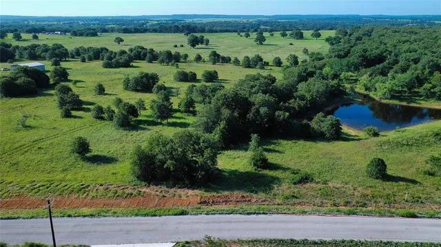 an aerial view of a yard with green space