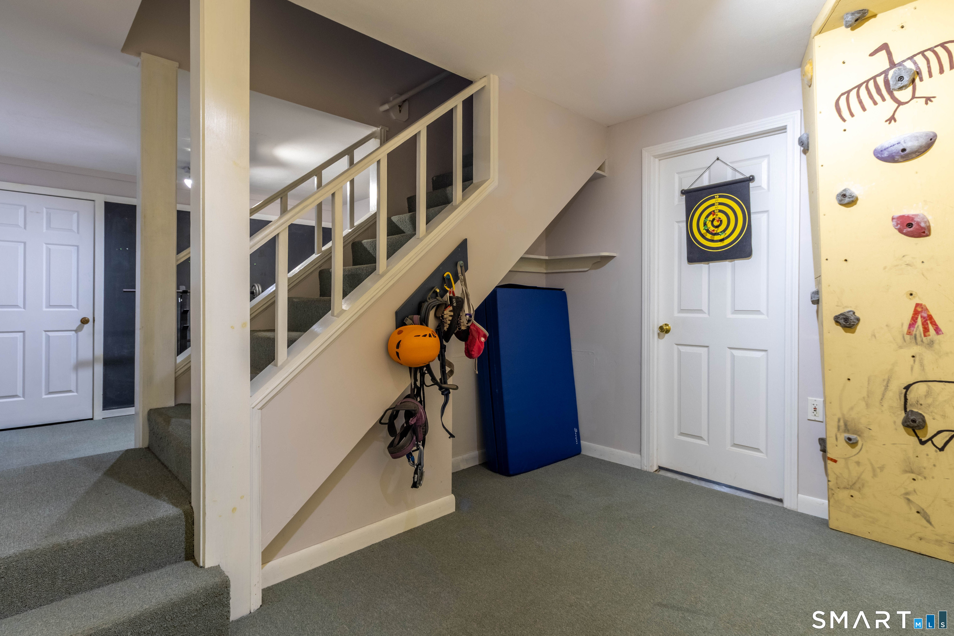 9 Rivendell Road Marlborough, CT 06447 - Photo 31 of 40 Lower level stairs and door to the workshop.