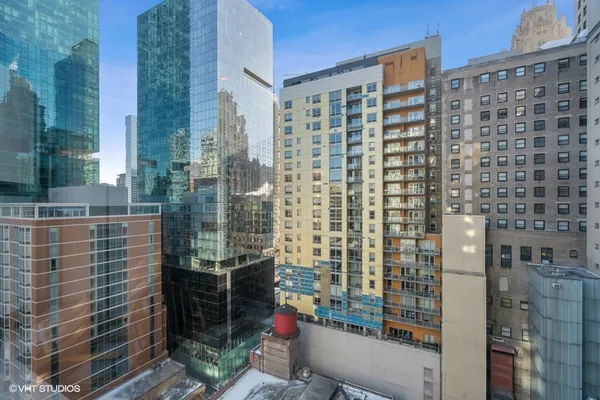 a view of a city with tall buildings