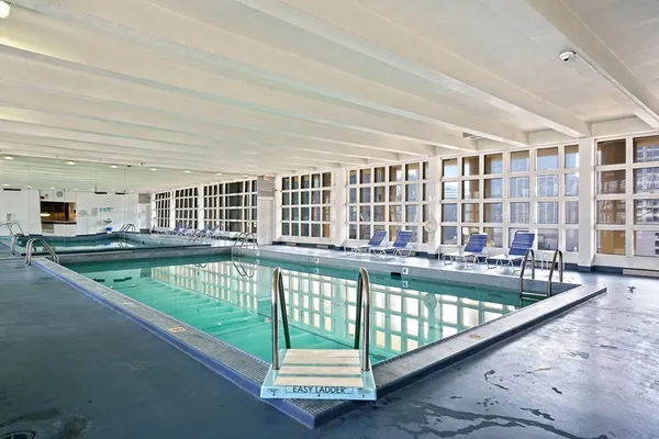 a view of a house with a swimming pool