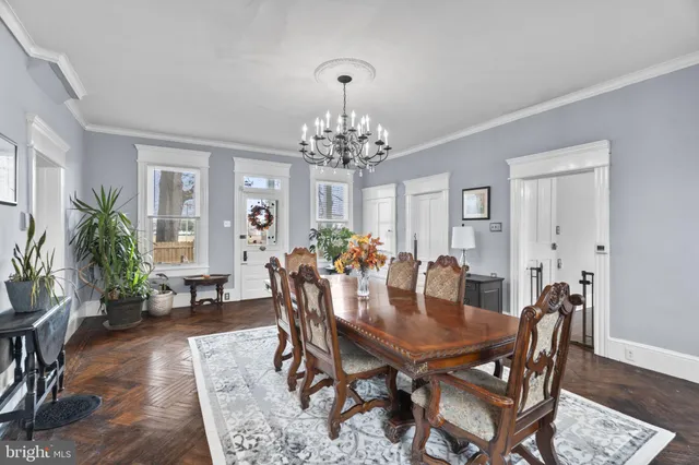 a view of a dining room with furniture and window