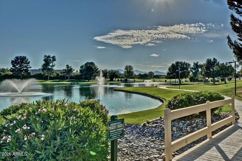 14300 West Bell Road, Unit 49 Surprise, AZ 85374 - Photo 14 of 19 a view of a swimming pool and outdoor space