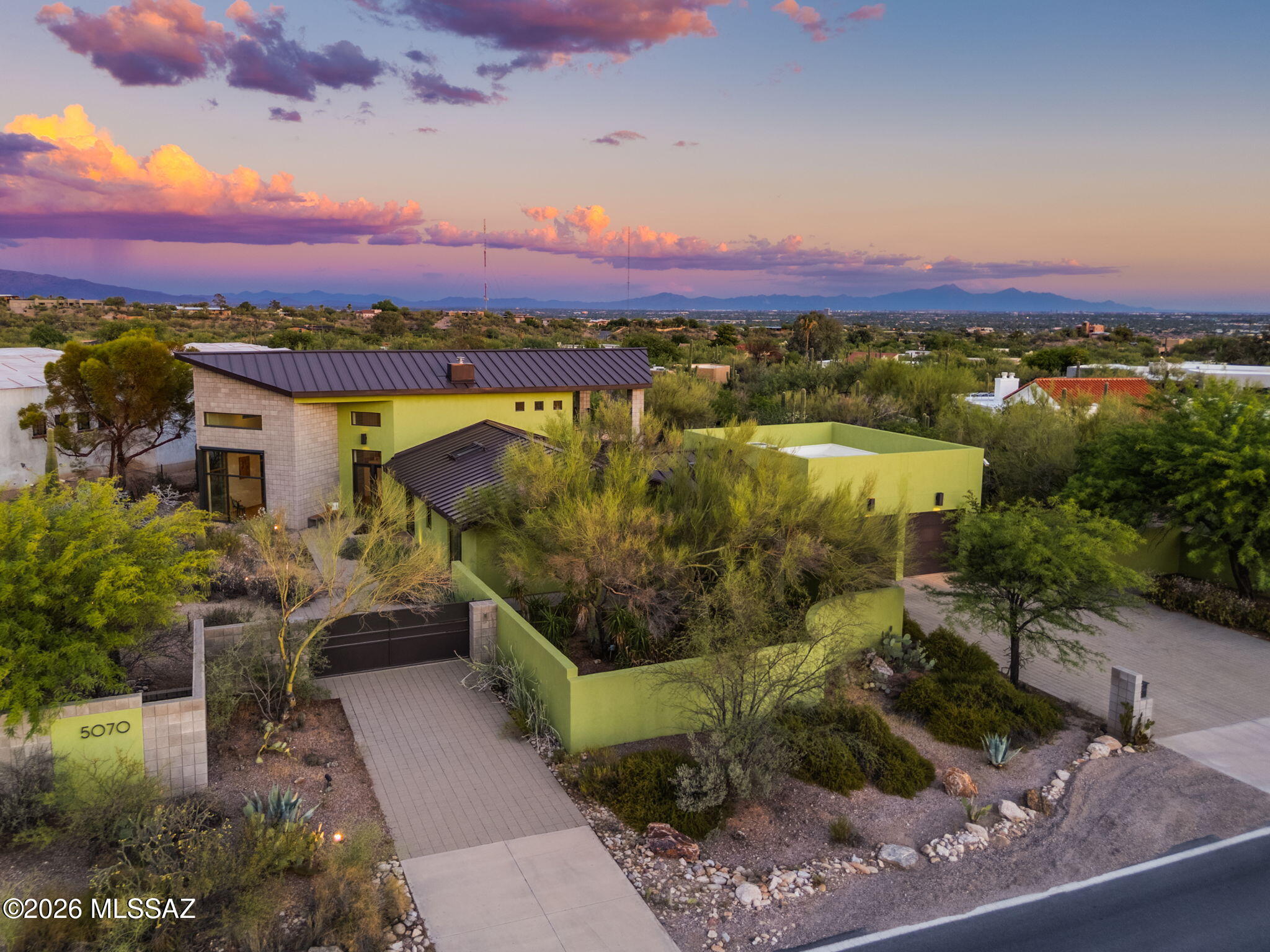 5070 North Valley View Road Tucson, AZ 85718 - Photo 6 of 51 a view of a house with a yard and lake view