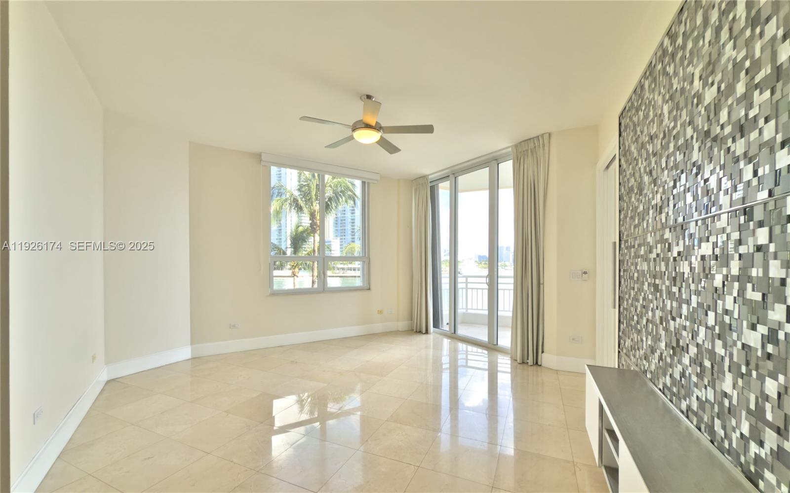 848 Brickell Key Drive, Unit 306 Miami, FL 33131 - Photo 12 of 66 a view of an empty room with a window