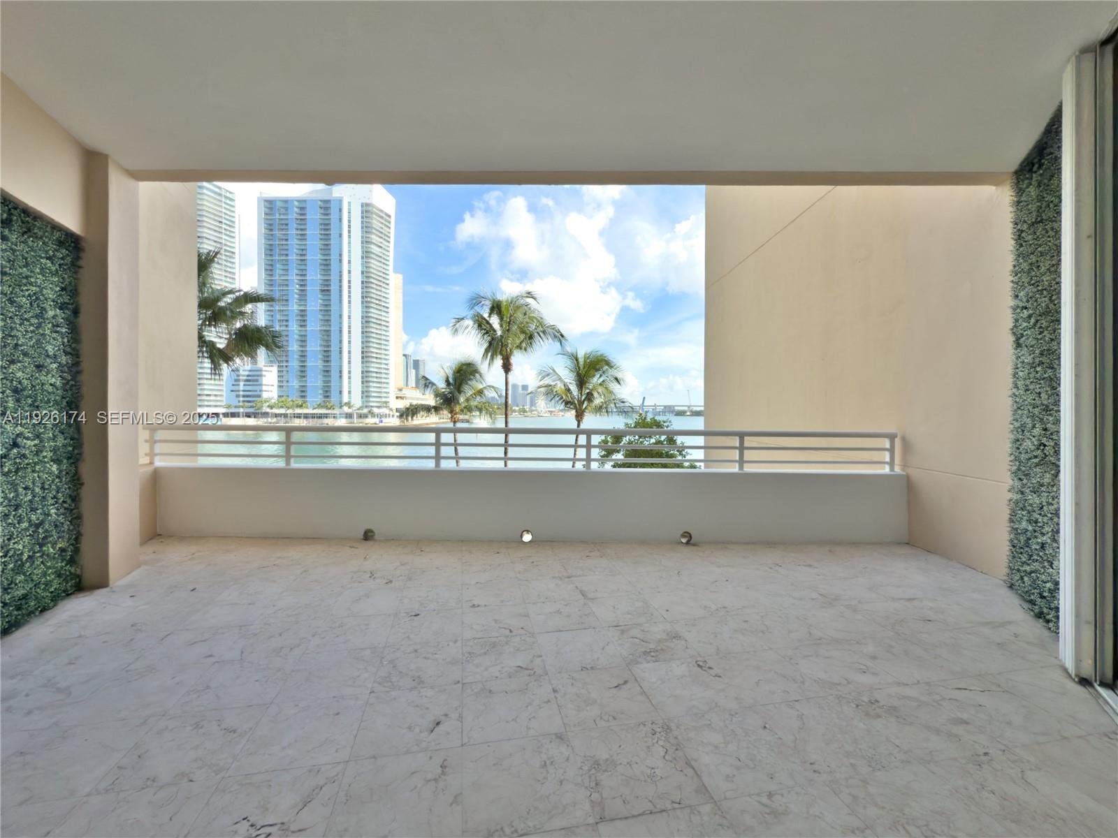 848 Brickell Key Drive, Unit 306 Miami, FL 33131 - Photo 32 of 66 a view of an empty room with a window