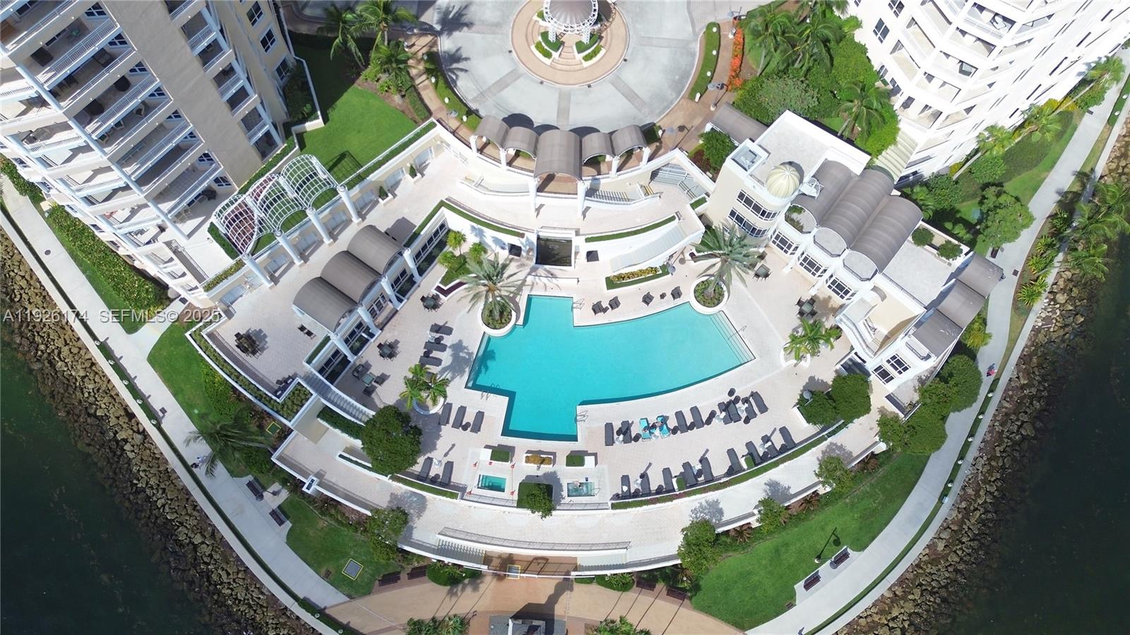 848 Brickell Key Drive, Unit 306 Miami, FL 33131 - Photo 43 of 66 a view of building and outdoor seating