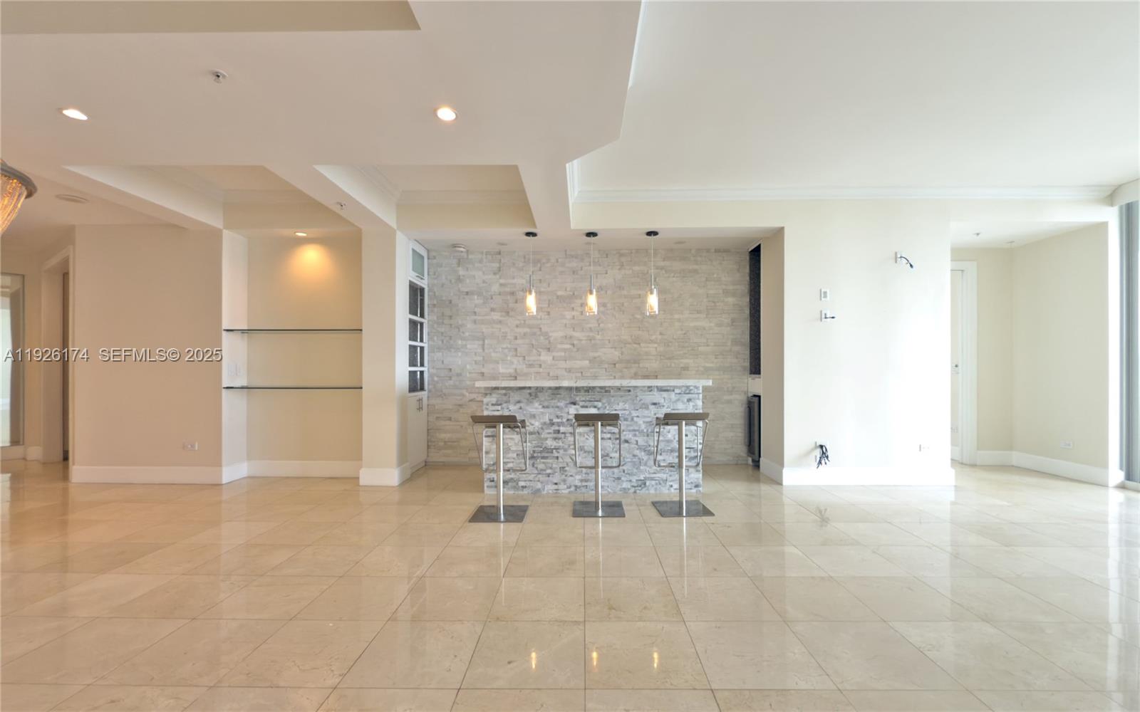 848 Brickell Key Drive, Unit 306 Miami, FL 33131 - Photo 5 of 66 a view of a big room with white walls