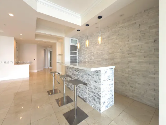 a bathroom with a glass door shower