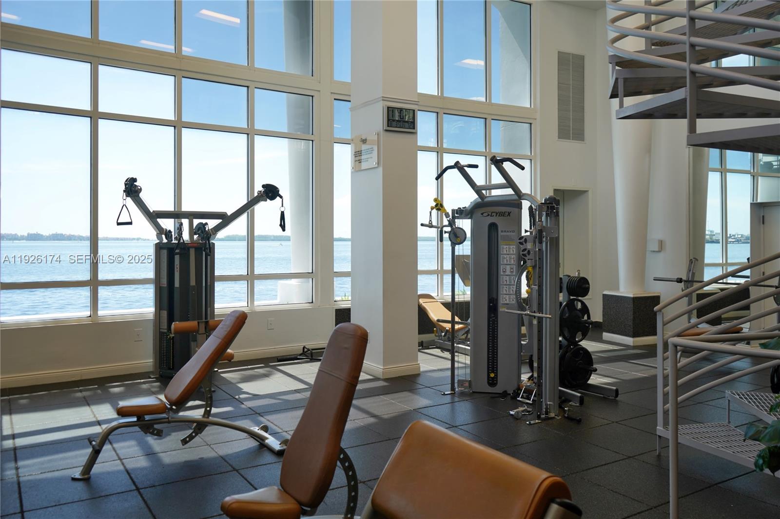 848 Brickell Key Drive, Unit 306 Miami, FL 33131 - Photo 62 of 66 a view of a room with gym equipment