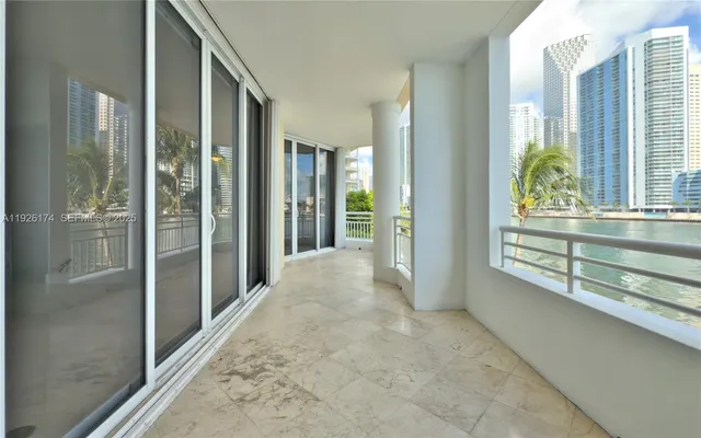 a view of a hallway with windows