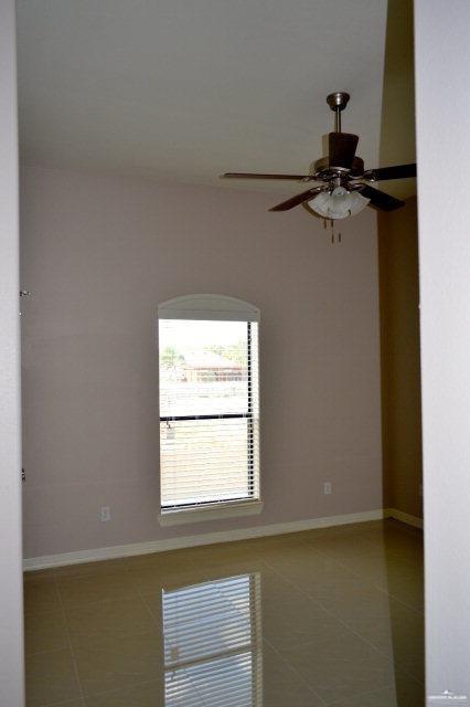 2705 Mimosa Street, Unit 7 Mission, TX 78574 - Photo 3 of 9 a view of a window in an empty room