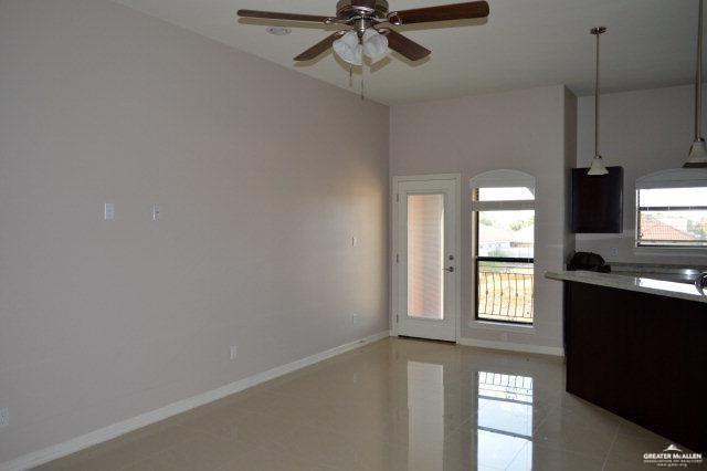 2705 Mimosa Street, Unit 7 Mission, TX 78574 - Photo 9 of 9 a view of empty room with window and ceiling fan