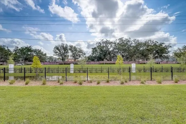 a view of a lake and a yard