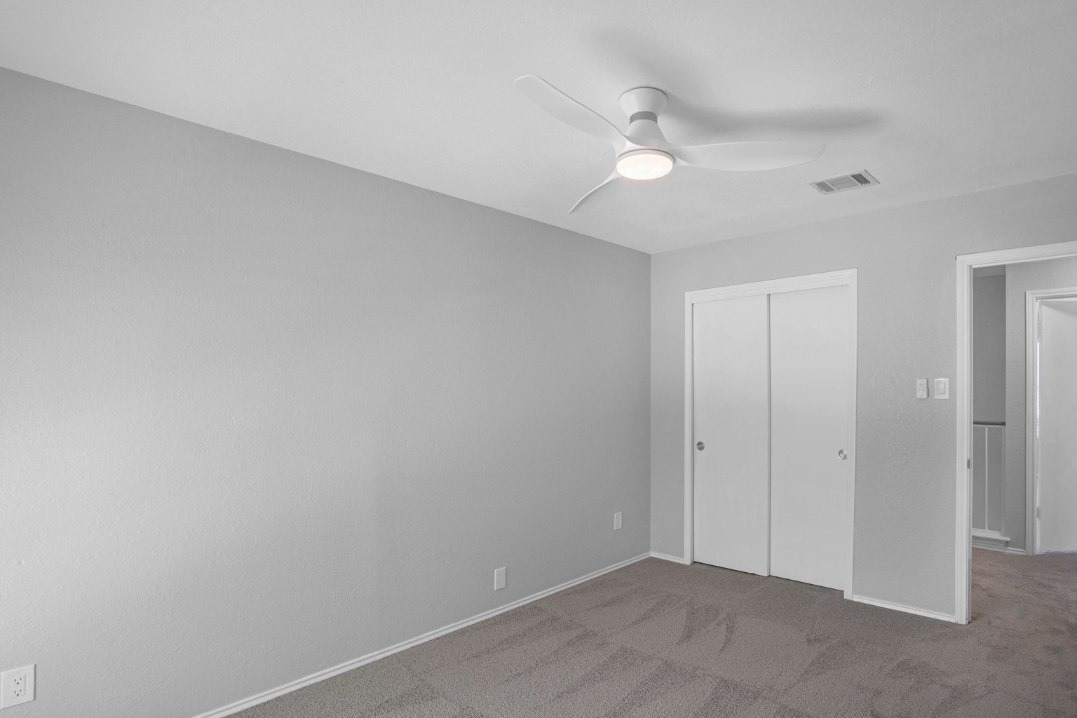 800 Smoke Signal Pass Pflugerville, TX 78660 - Photo 11 of 40 A well-lit bedroom provides ample space for comfortable living.