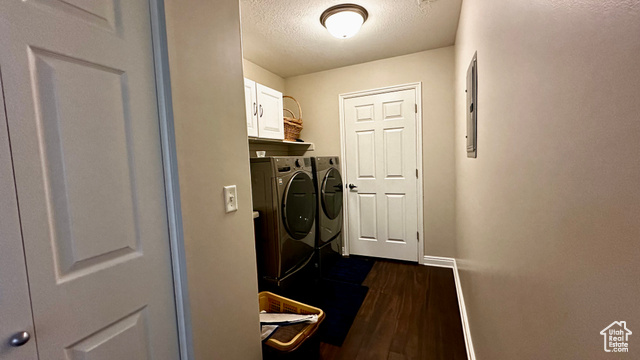 929 West 1920 South, Unit A Syracuse, UT 84075 - Photo 26 of 26 Laundry area featuring cabinets, dark hardwood / wood-style flooring, washer and dryer, and a storage closet