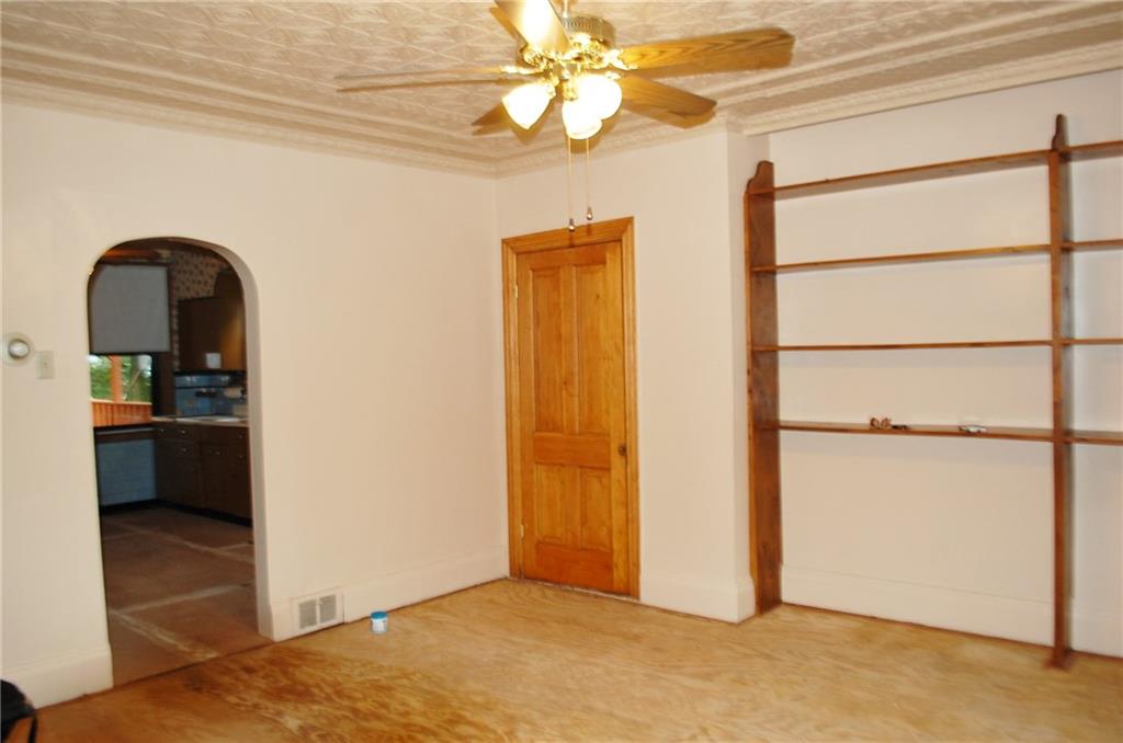 46 Solar Street Pittsburgh, PA 15212 - Photo 2 of 25 Living Room Has Restored Tin Ceiling & Shelves
