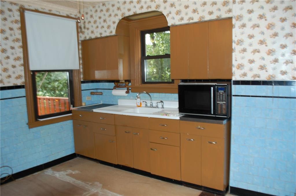 46 Solar Street Pittsburgh, PA 15212 - Photo 6 of 25 Kitchen Opens To Deck and Wooded Views