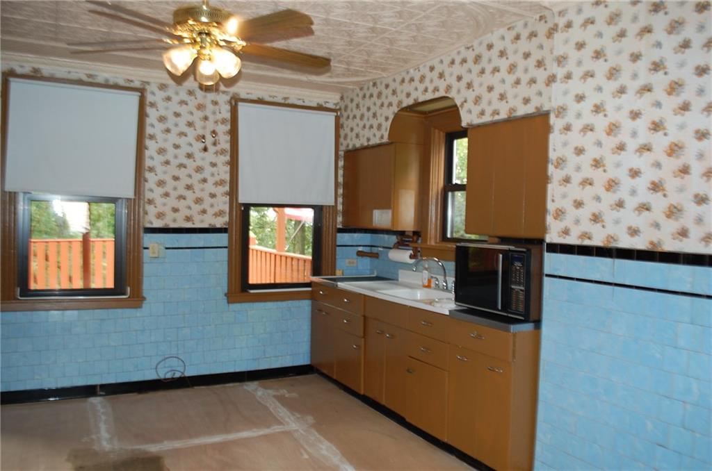 46 Solar Street Pittsburgh, PA 15212 - Photo 7 of 25 Kitchen has Ceiling Fan and Tin Ceiling