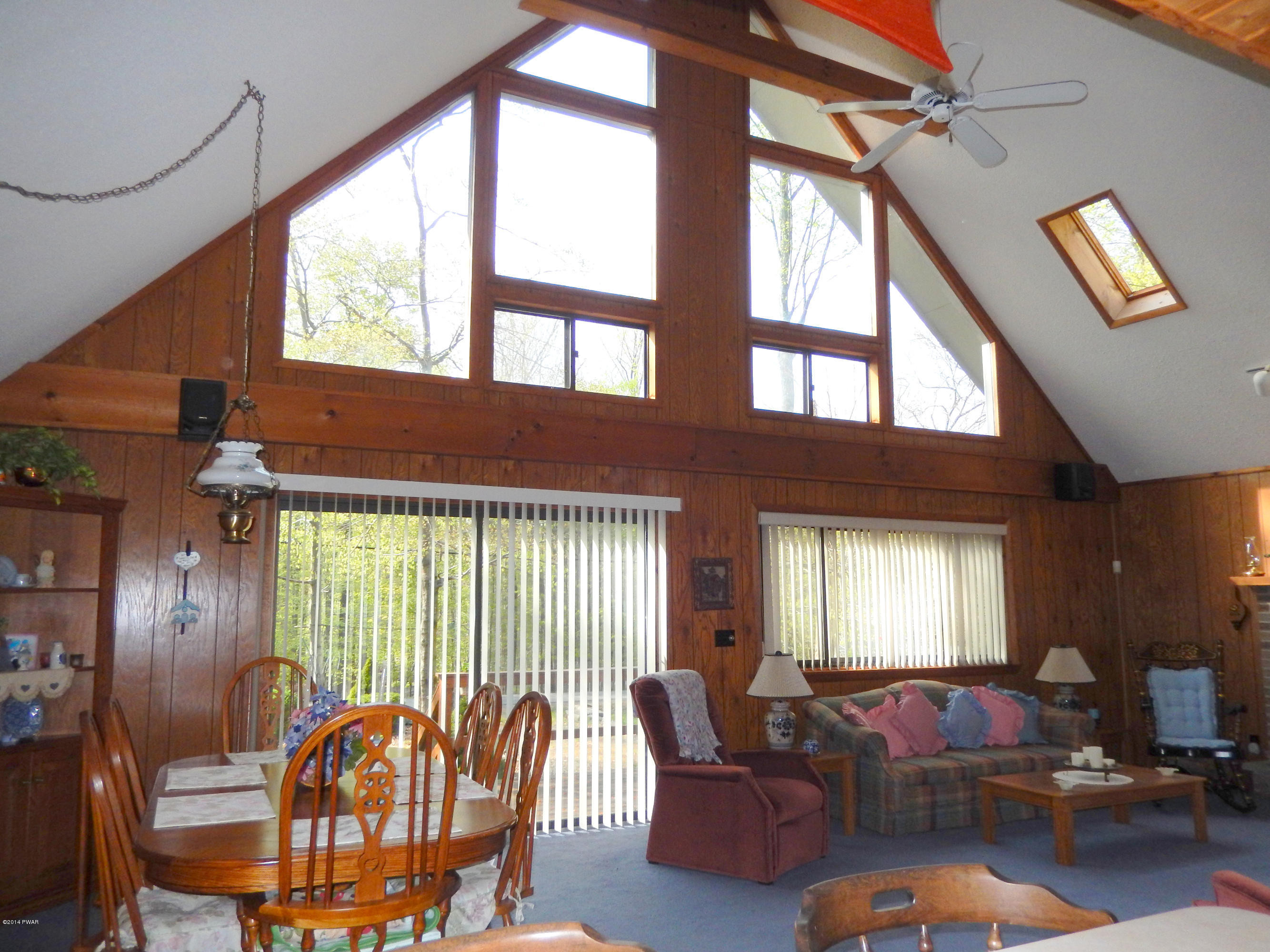 3190 Northgate Road Lake Ariel, PA 18436 - Photo 5 of 56 a living room with furniture or couch and a large window
