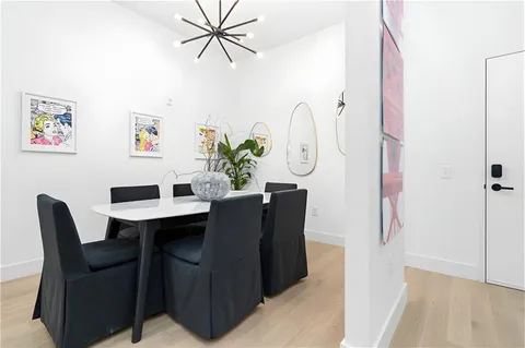 a view of a dining room with furniture