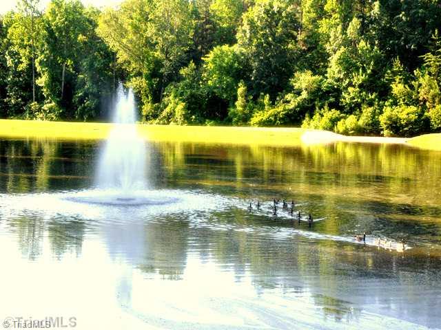 6697 Fegan Road Summerfield, NC 27358 - Photo 3 of 4 Other. 4 acre community pond with fountain make the perfect backdrop to this building lot!