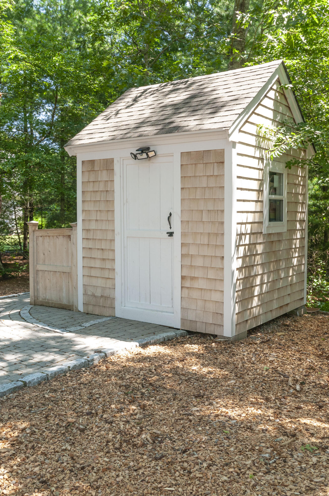 1774 South County Road Osterville, MA 02655 - Photo 18 of 75 a view of a small house with wooden fence