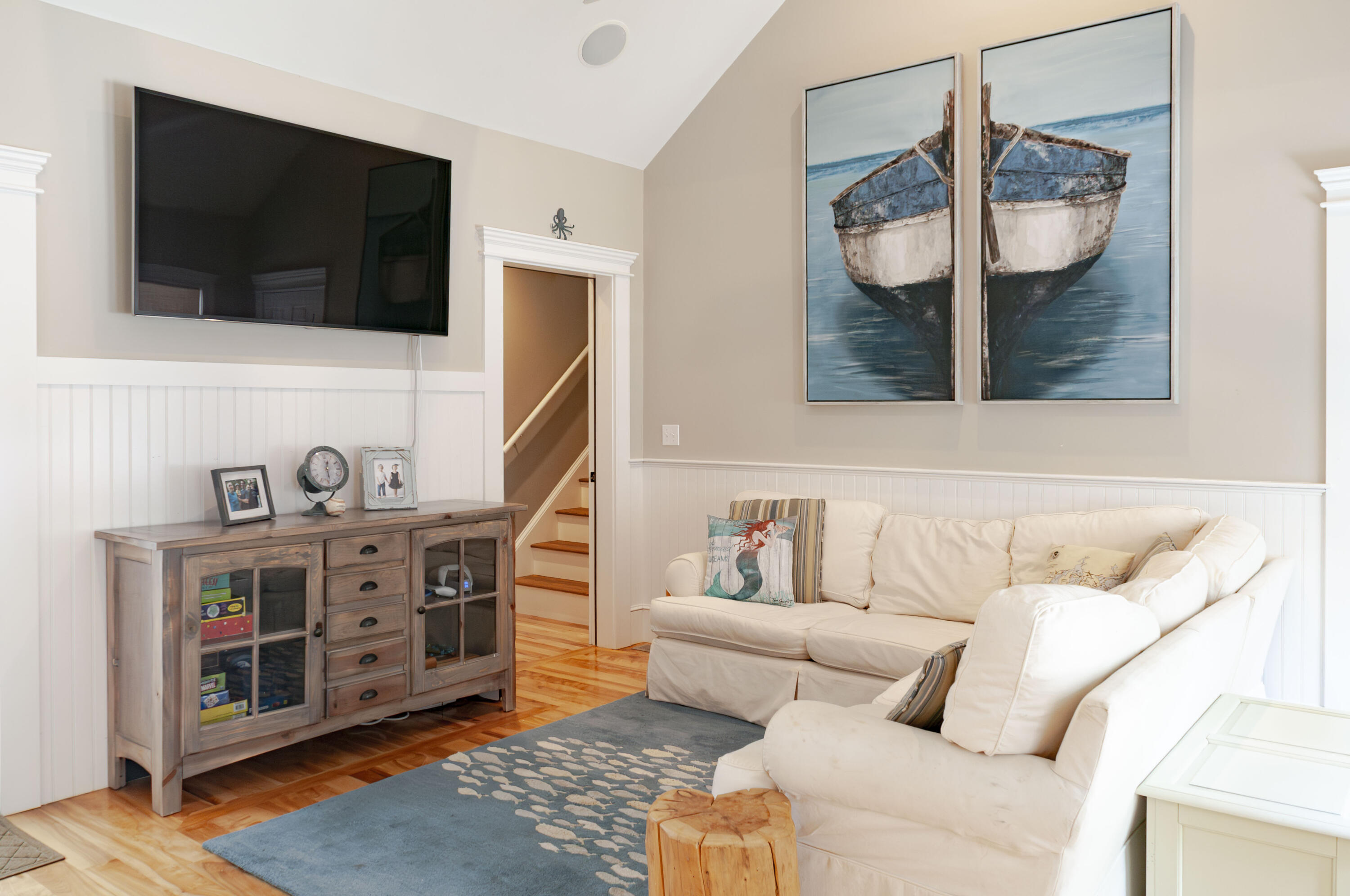 1774 South County Road Osterville, MA 02655 - Photo 20 of 75 a living room with furniture and a flat screen tv