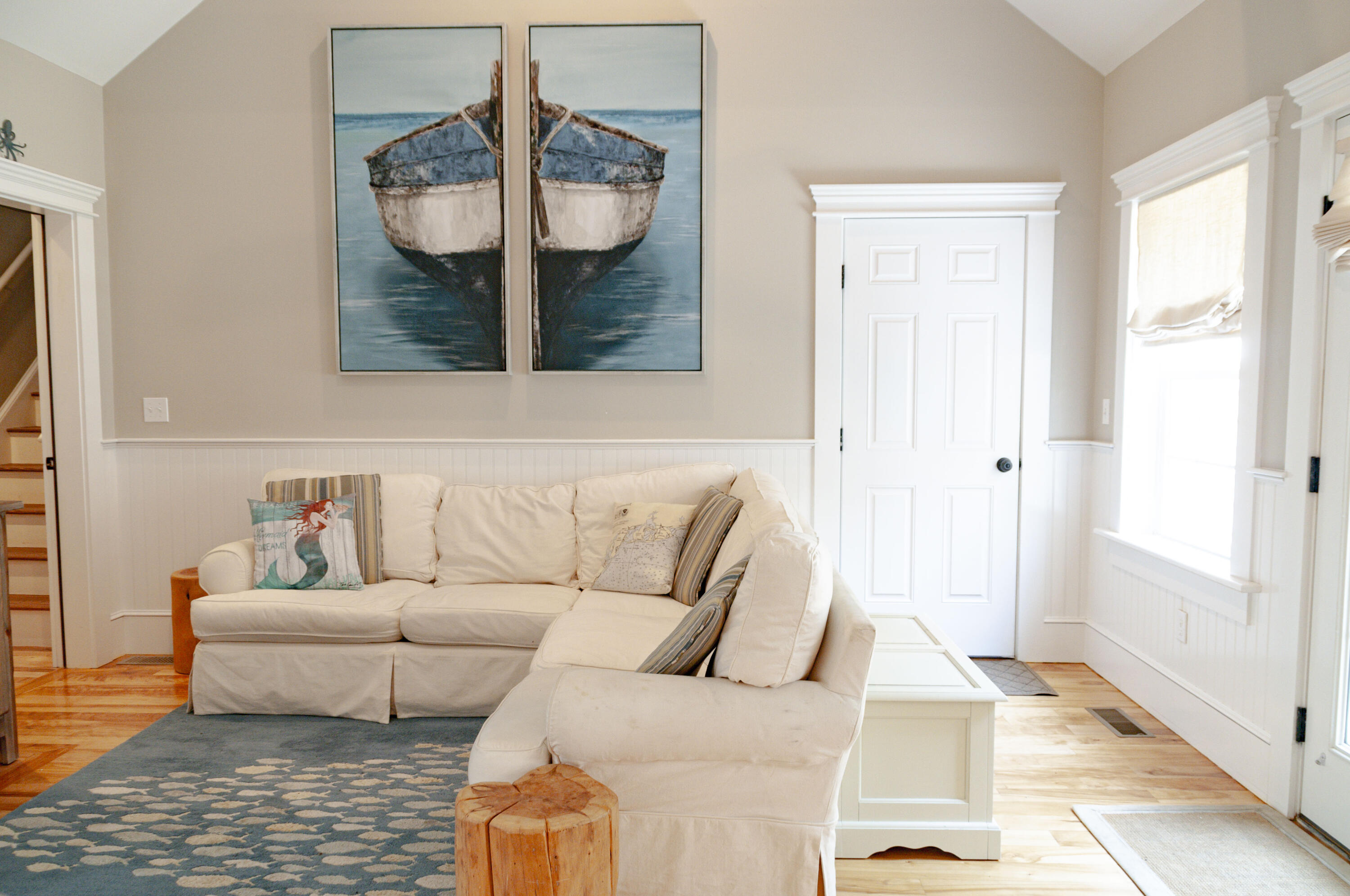 1774 South County Road Osterville, MA 02655 - Photo 21 of 75 a living room with a couch and a coffee table