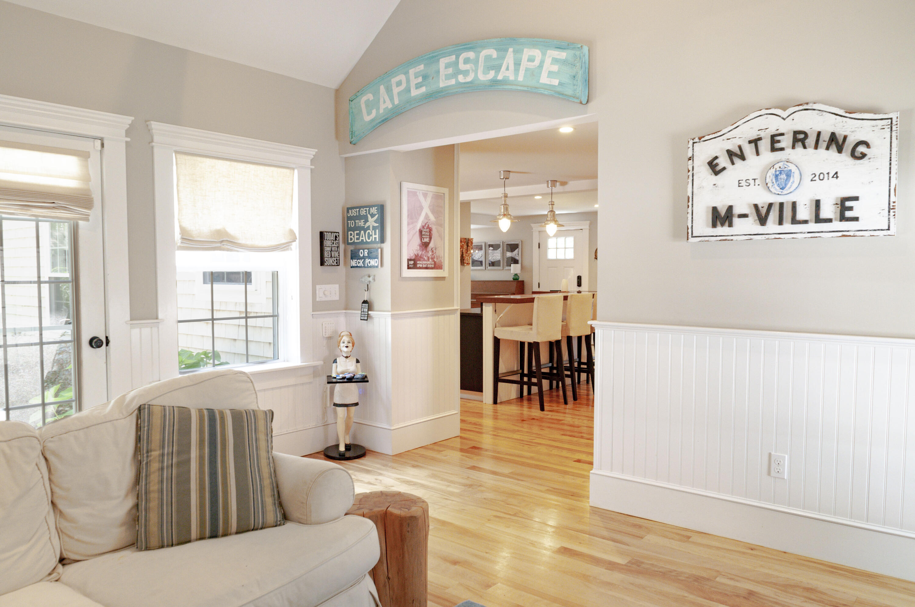 1774 South County Road Osterville, MA 02655 - Photo 22 of 75 a living room with furniture and a table