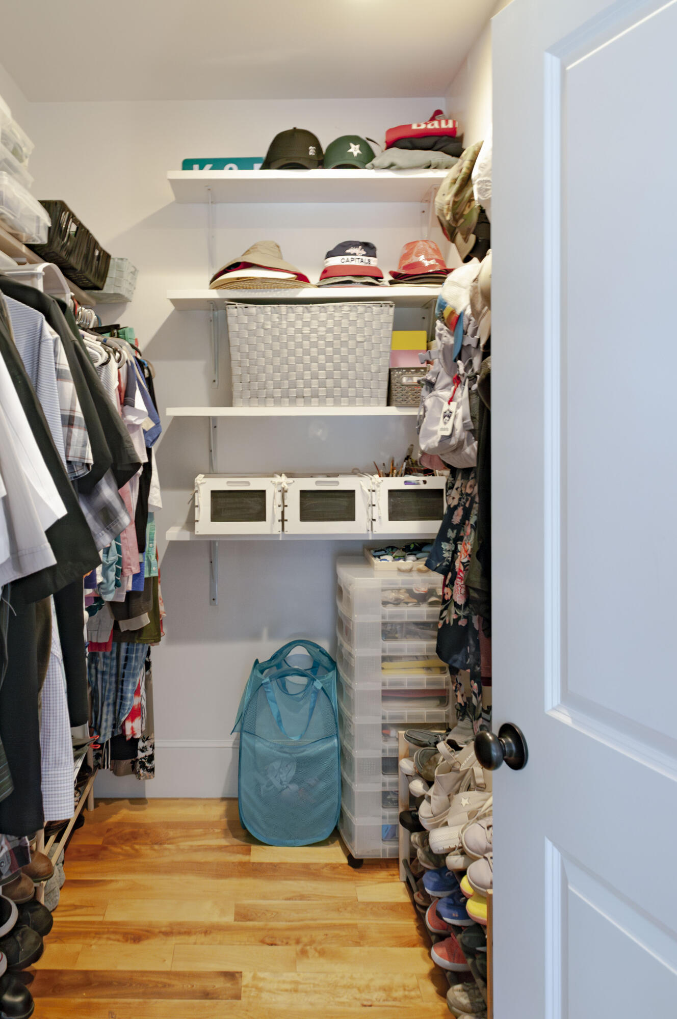 1774 South County Road Osterville, MA 02655 - Photo 44 of 75 a view of walk in closet with clothes and shoes