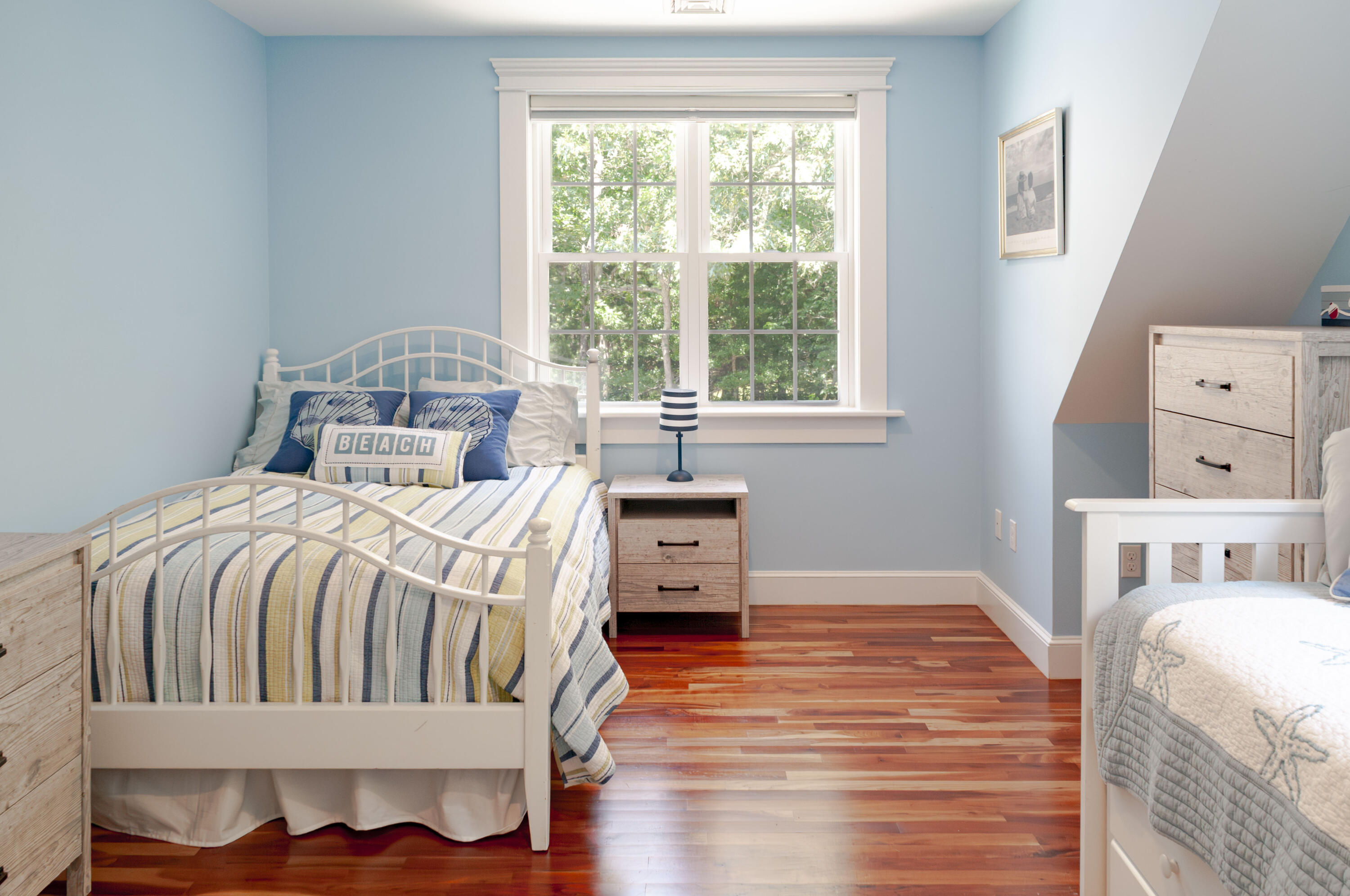 1774 South County Road Osterville, MA 02655 - Photo 55 of 75 a bedroom with a bed and wooden floor