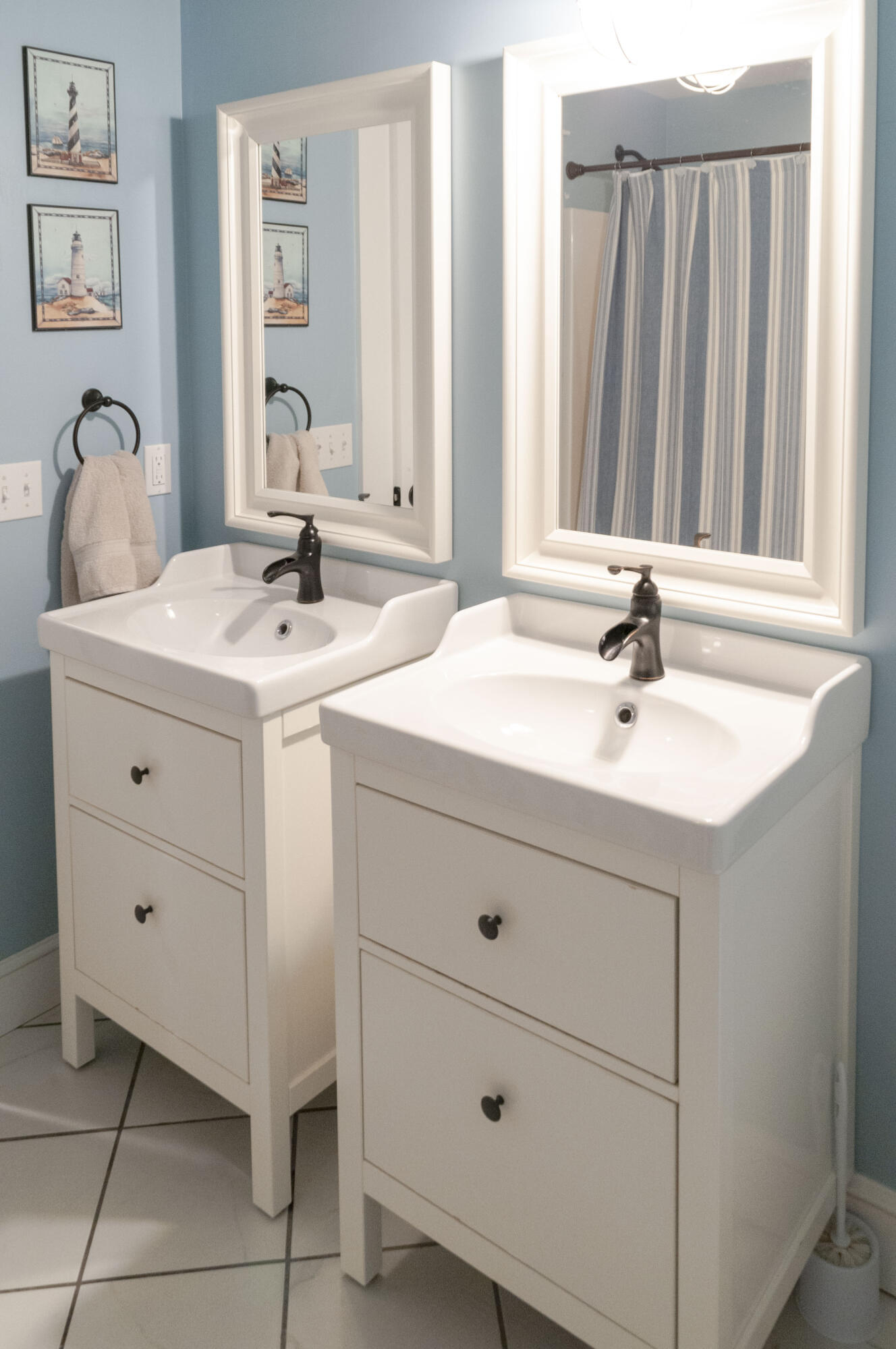 1774 South County Road Osterville, MA 02655 - Photo 56 of 75 a bathroom with a sink and a mirror