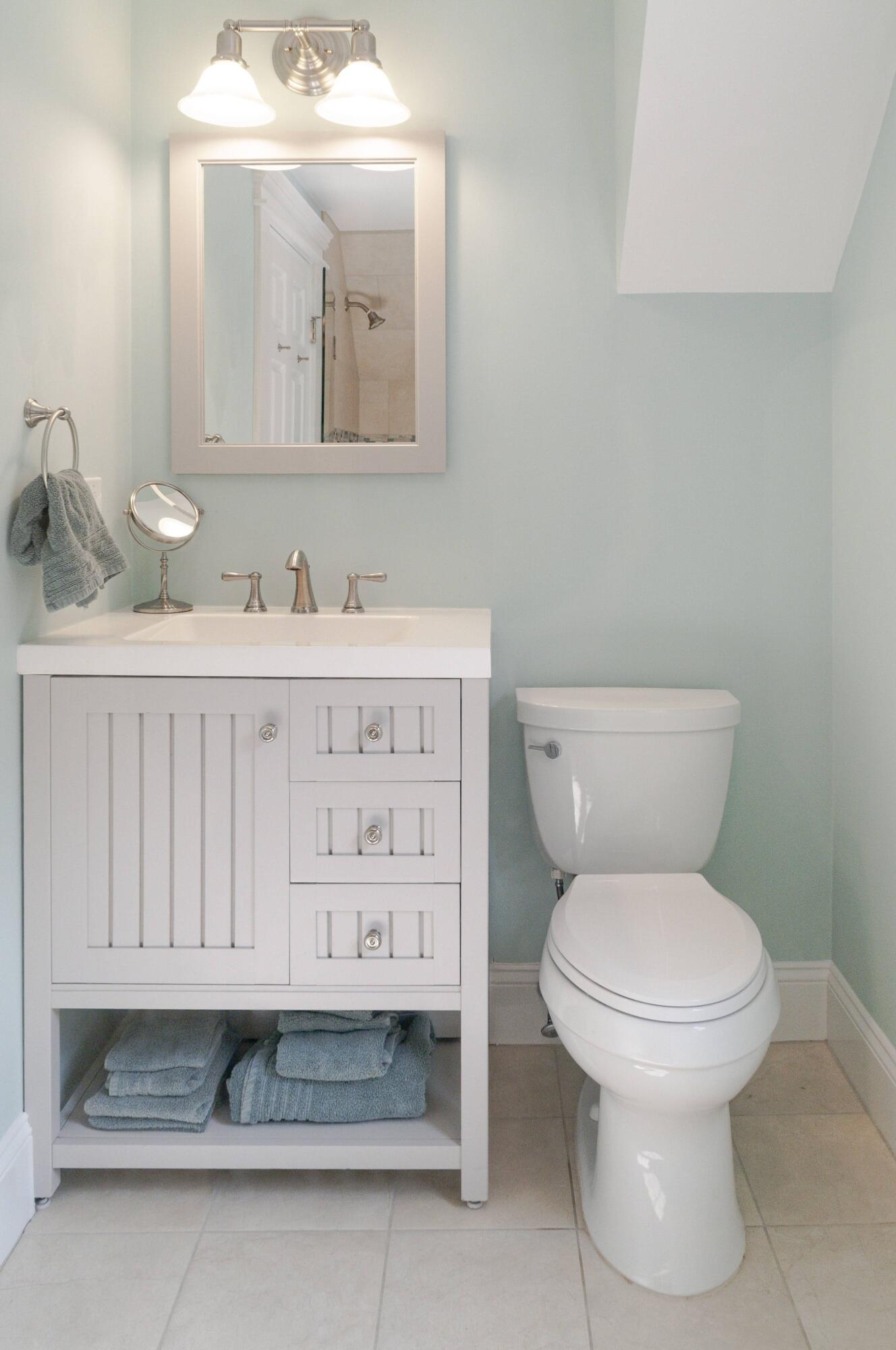 1774 South County Road Osterville, MA 02655 - Photo 70 of 75 a bathroom with a toilet sink and mirror