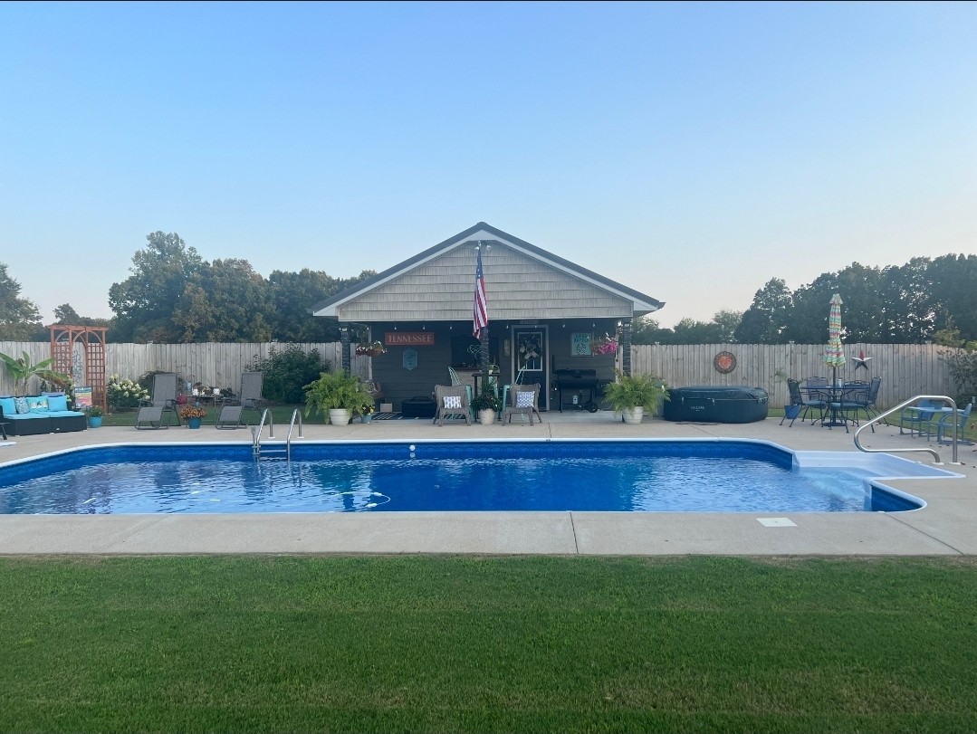 99 Busby Road Loretto, TN 38469 - Photo 22 of 25 a view of house with garden and patio